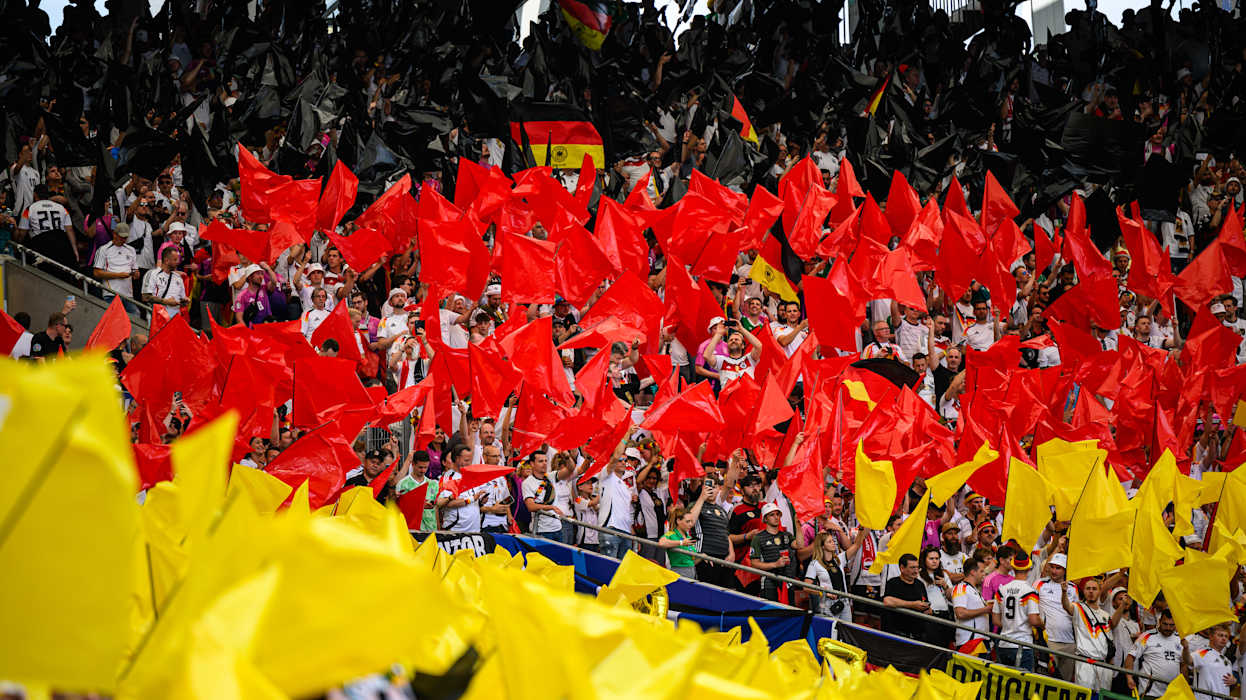 Fans of Germany support their team with flags and a choreographyGES/ Fussball/ UEFA Euro 2024: Spiel 14: Deutschland - Ungarn, 19.06.2024Football / Soccer: UEFA Euro 2024: Match 14: Germany vs Hungary, Stuttgart, June 19, 2024