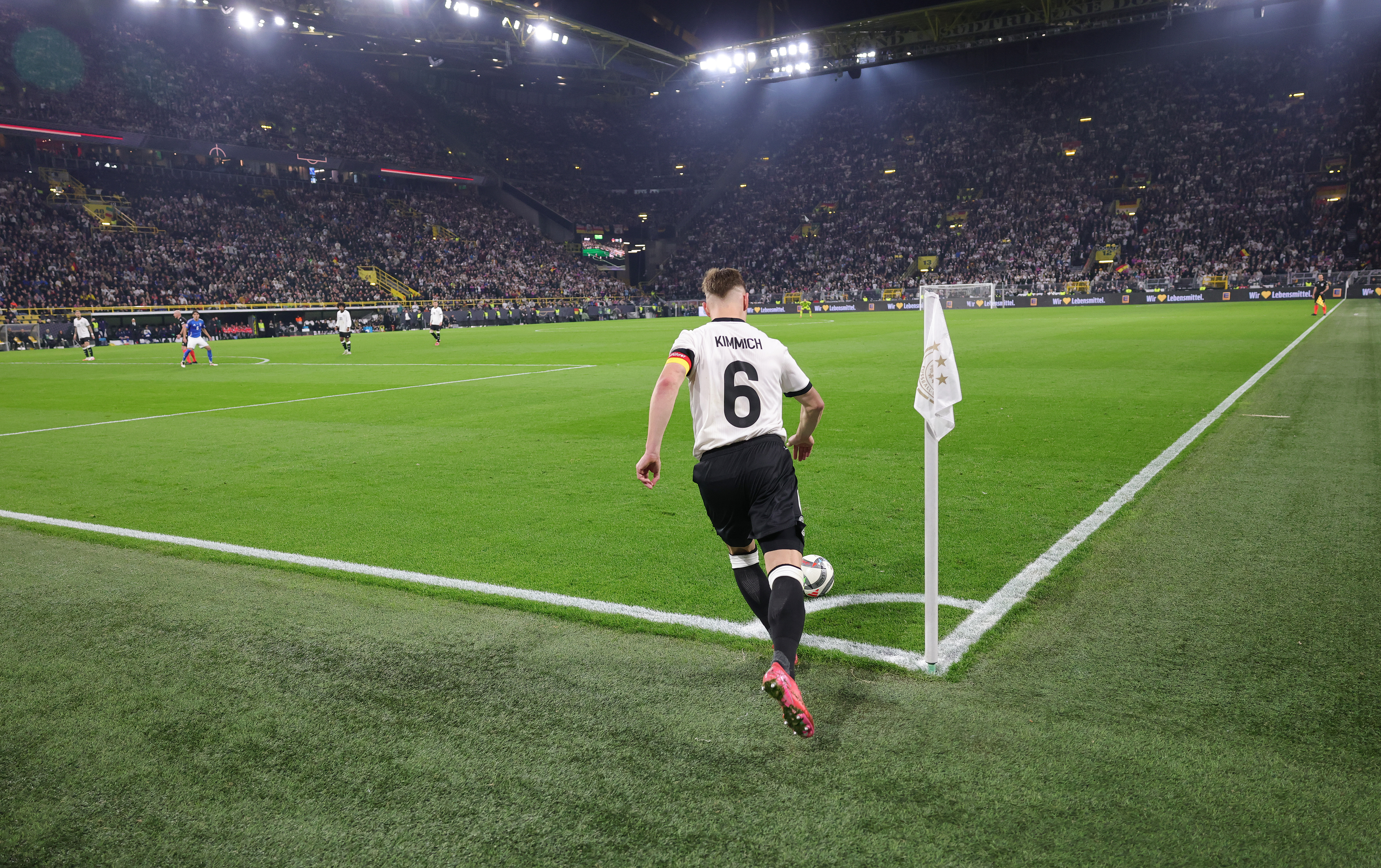 DORTMUND, GERMANY - MARCH 23: corner ball of Joshua Kimmich of Germany at the Signal Iduna Park during the UEFA Nations League Quarterfinal Leg Two match between Germany and Italy at Football Stadium Dortmund on March 23, 2025 in Dortmund, Germany. (Photo by Jürgen Fromme - firo sportphoto/Getty Images)
