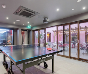 Table tennis room with courtyard