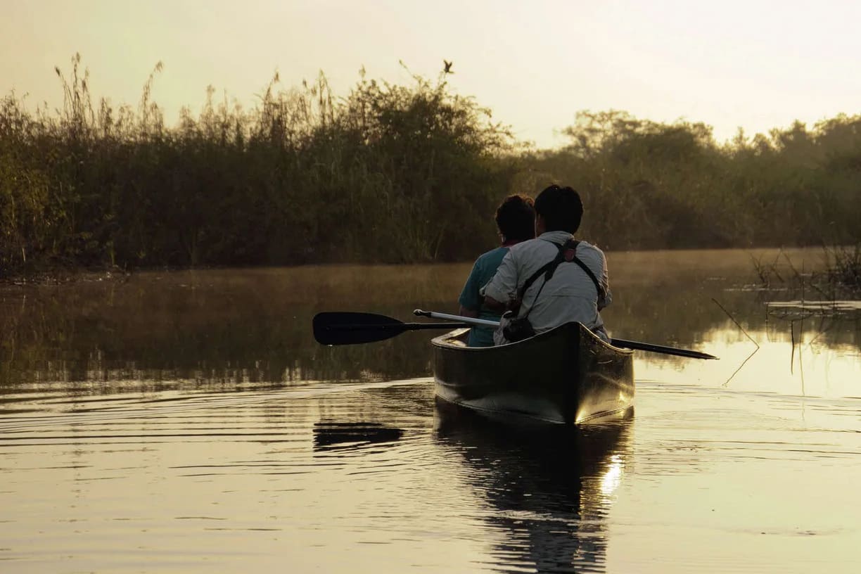 Paddling in a canoe