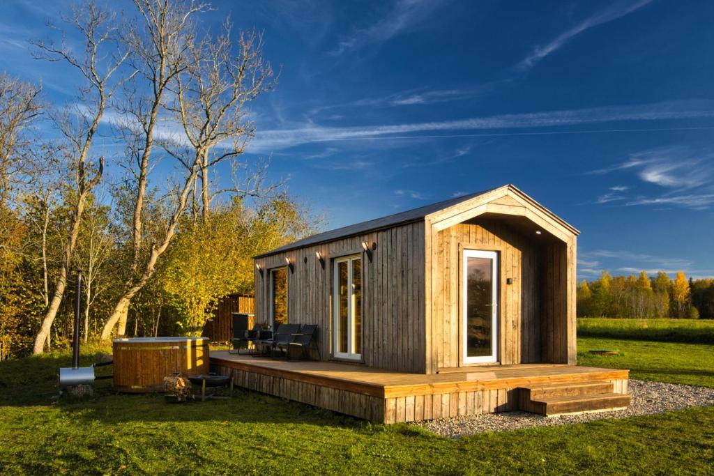 Paberzi Design Cabin — Riverside Serenity in Rural Latvia