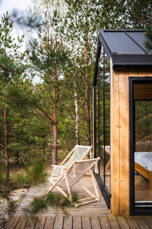 Forestic Lietuva — Lakeside Serenity in a Modern Cabin