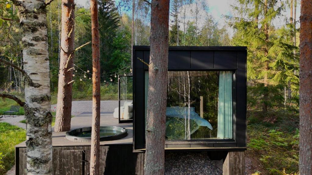 Luxury Forest Cabin with Hot Tub — Estonian Woodland Sanctuary
