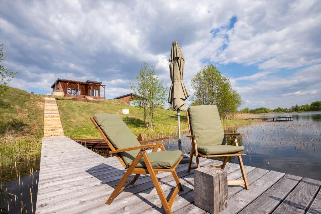 Pineplace twins NIDA — Lakeside Serenity in the Lithuanian Countryside