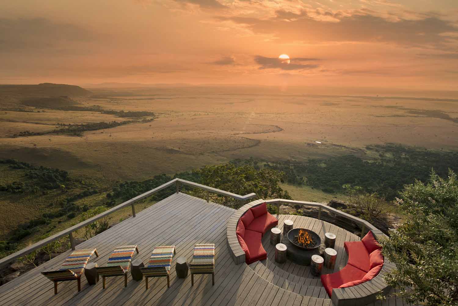 Sunrise over the Maasai Mara from the deck of Angama Mara, on the Oloololo escarpment