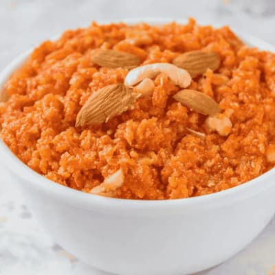 Gajar Halwa garnished with Nuts and Mawa