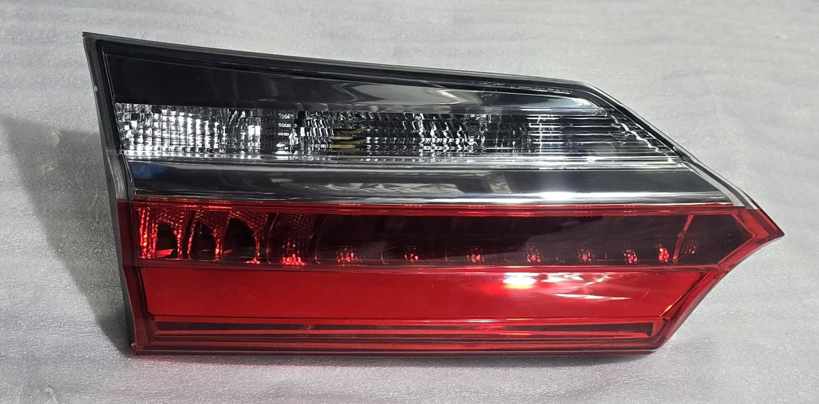 LEFT TRUNK LIGHT REFLECTOR thumbnail