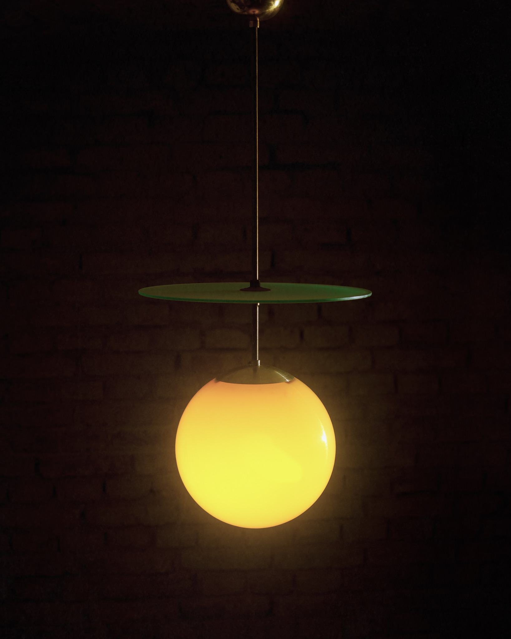 Paavo Tynell was a pioneering Finnish lighting designer and co-founder of Taito, known for bringing warmth and poetic elegance to modernist design. His work from the 1930s helped d