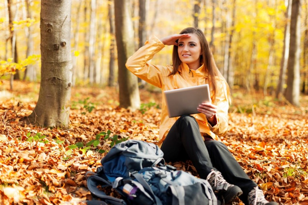 a-woman-in-the-forest-looking-for-something-around.jpeg