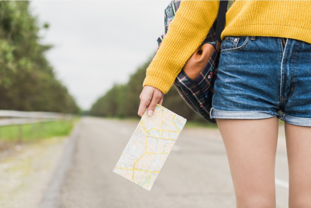 woman walking alone on the road.jpeg