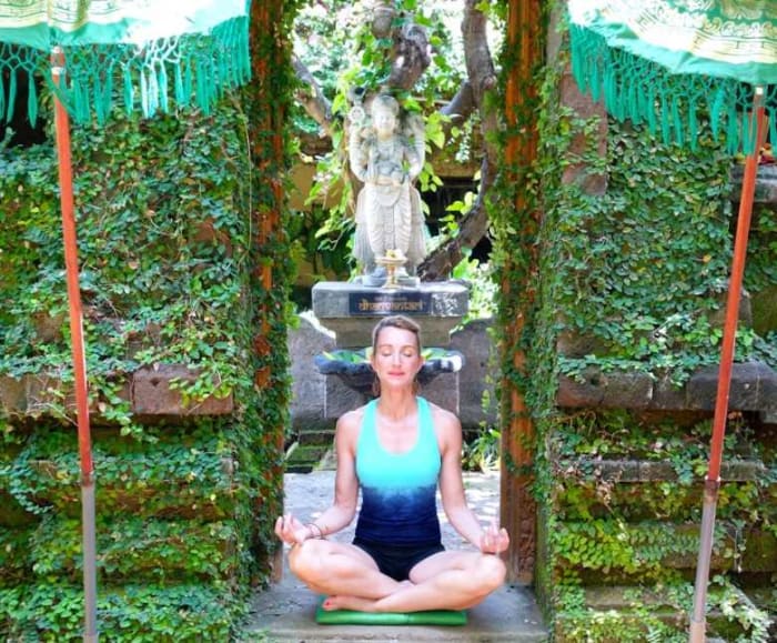 Woman meditating in Bali.jpg