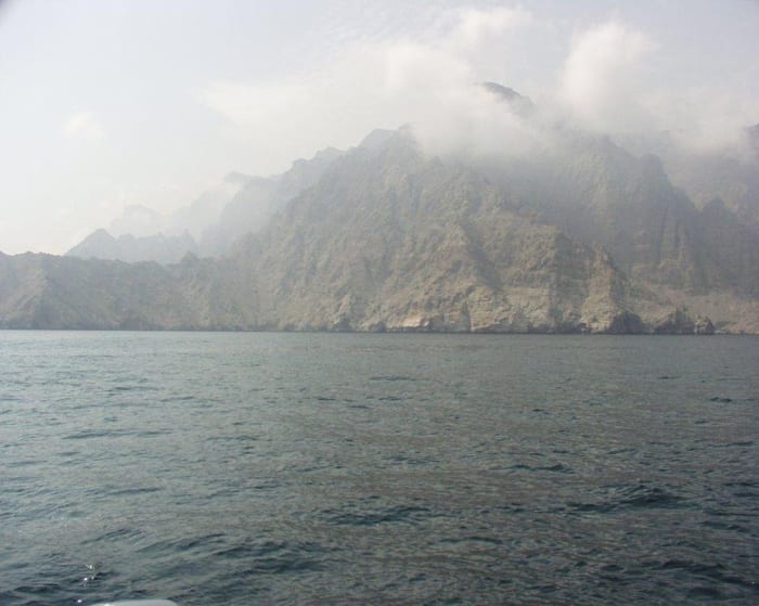 Rocky mountains along the Musandam coastline viewed from the sea..jpg