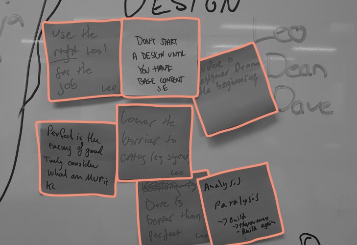 post it notes on a wall with handwriting on them 