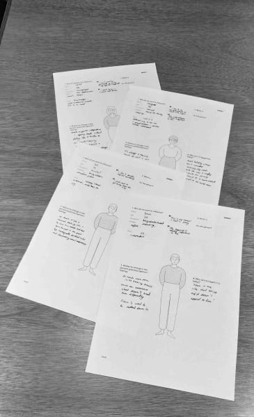 A photo of sketches of people