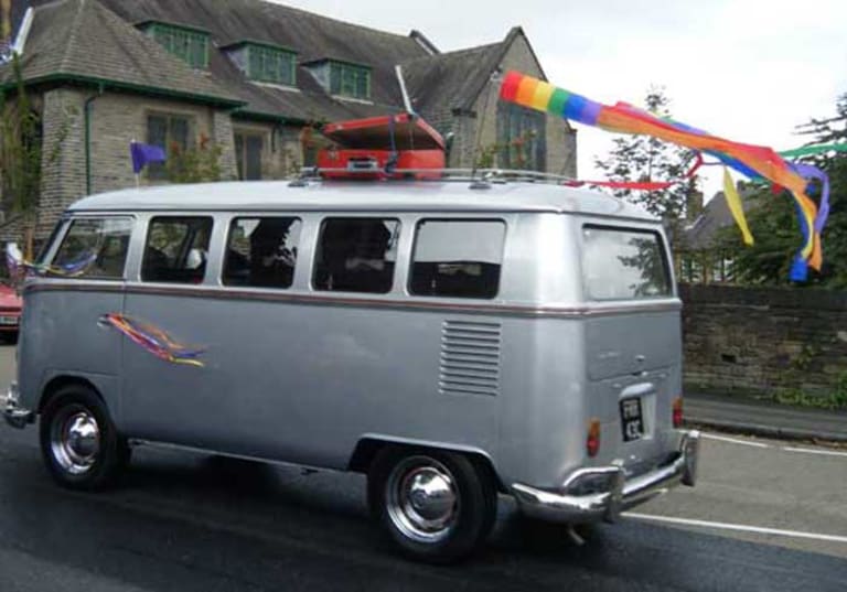Silver camper van hearse
