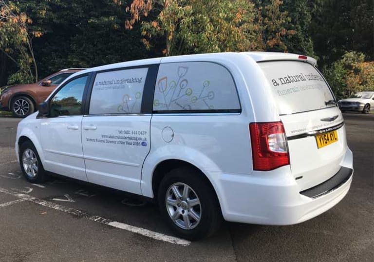 White Chrysler hearse