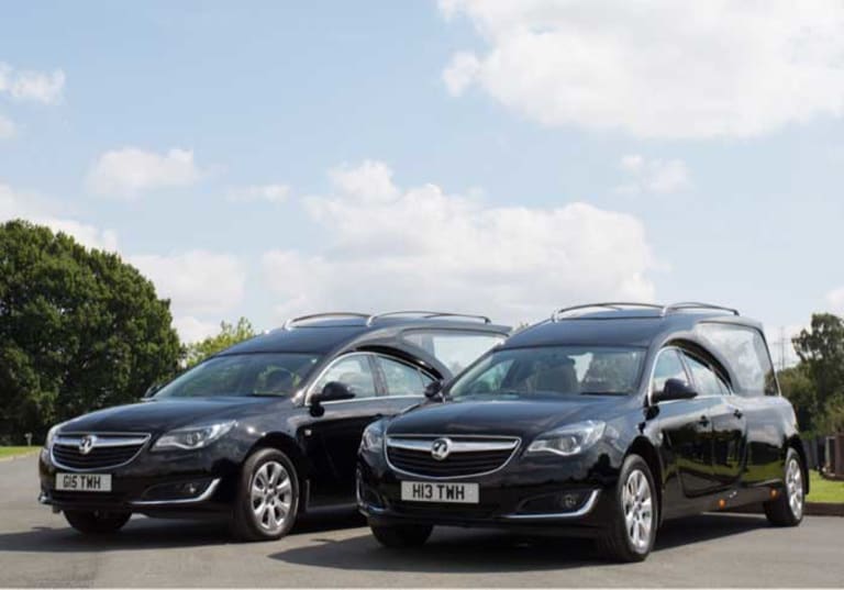 Traditional black hearses