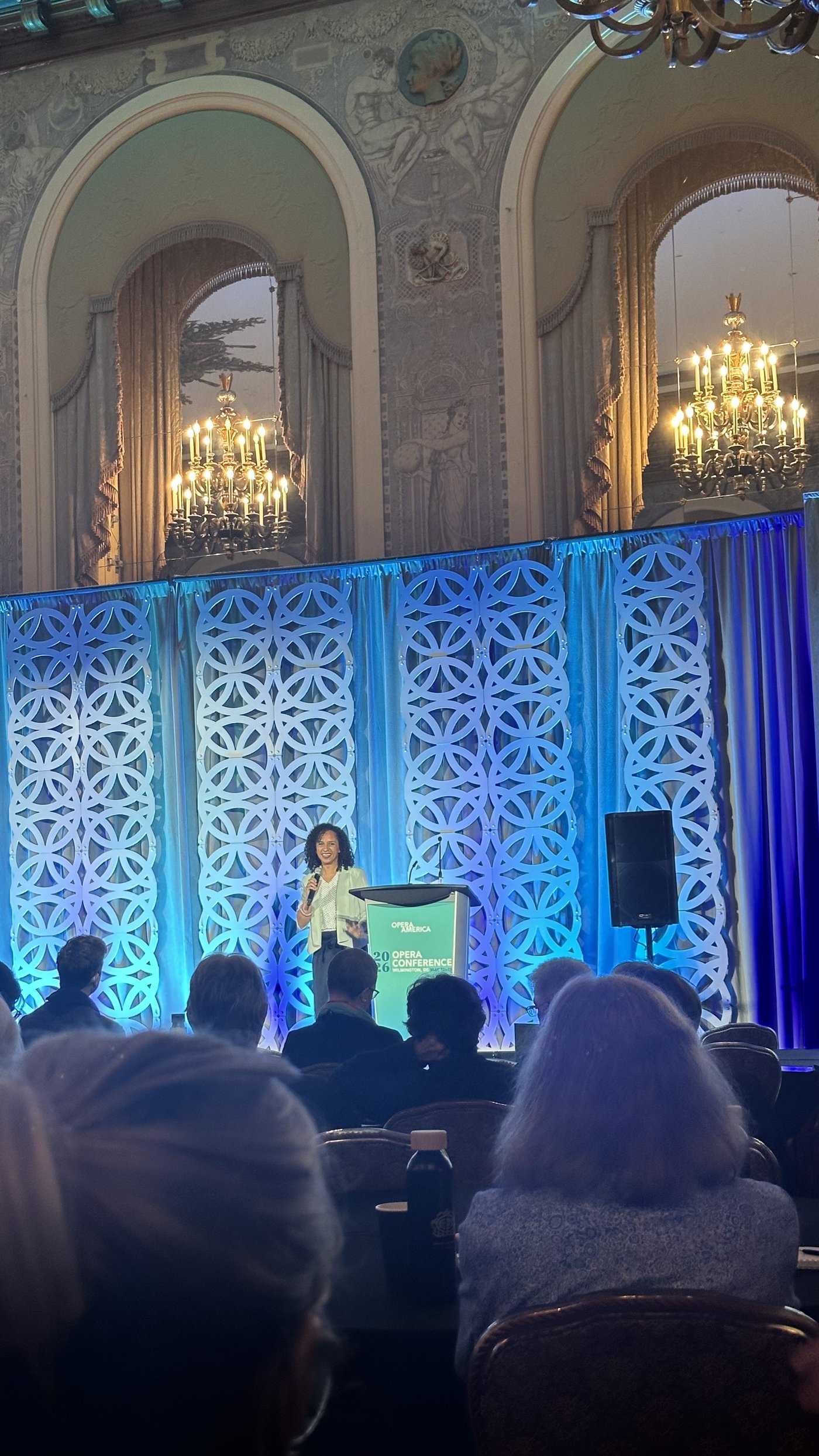 Kira Troilo speaking on the OPERA America National Conference mainstage, 2026
