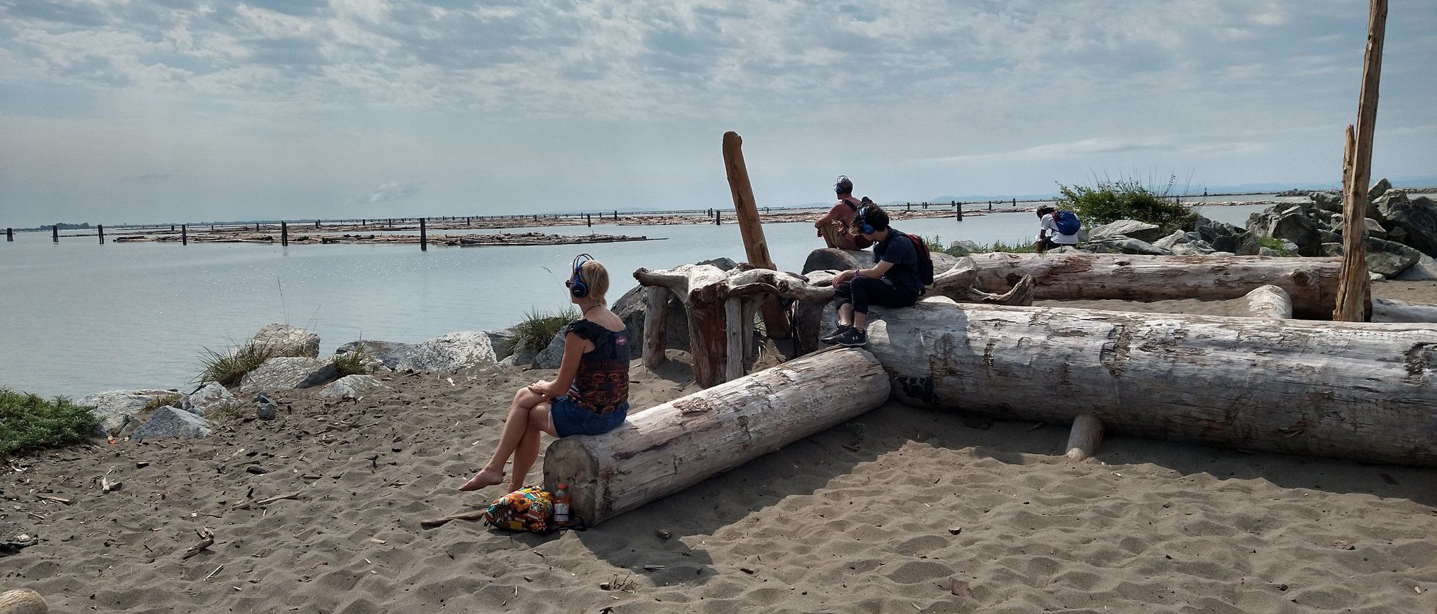 Jacek Smolicki soundwalk with participants listening on waterfront