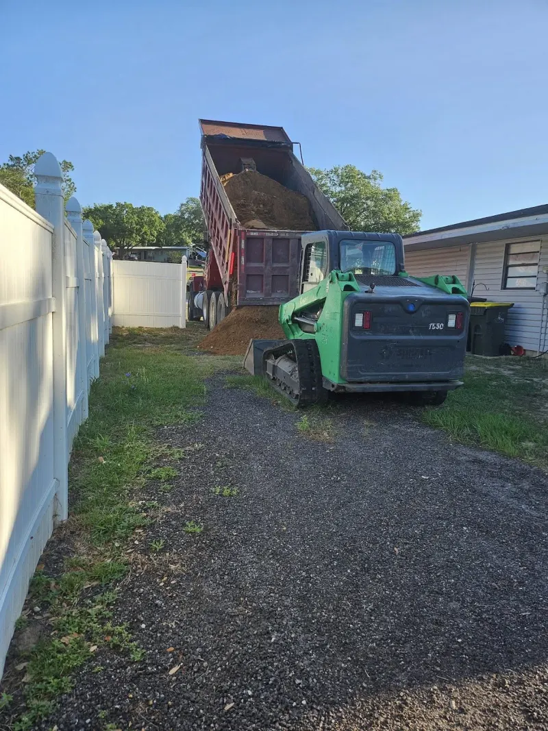 Dump Truck Removing Debris
