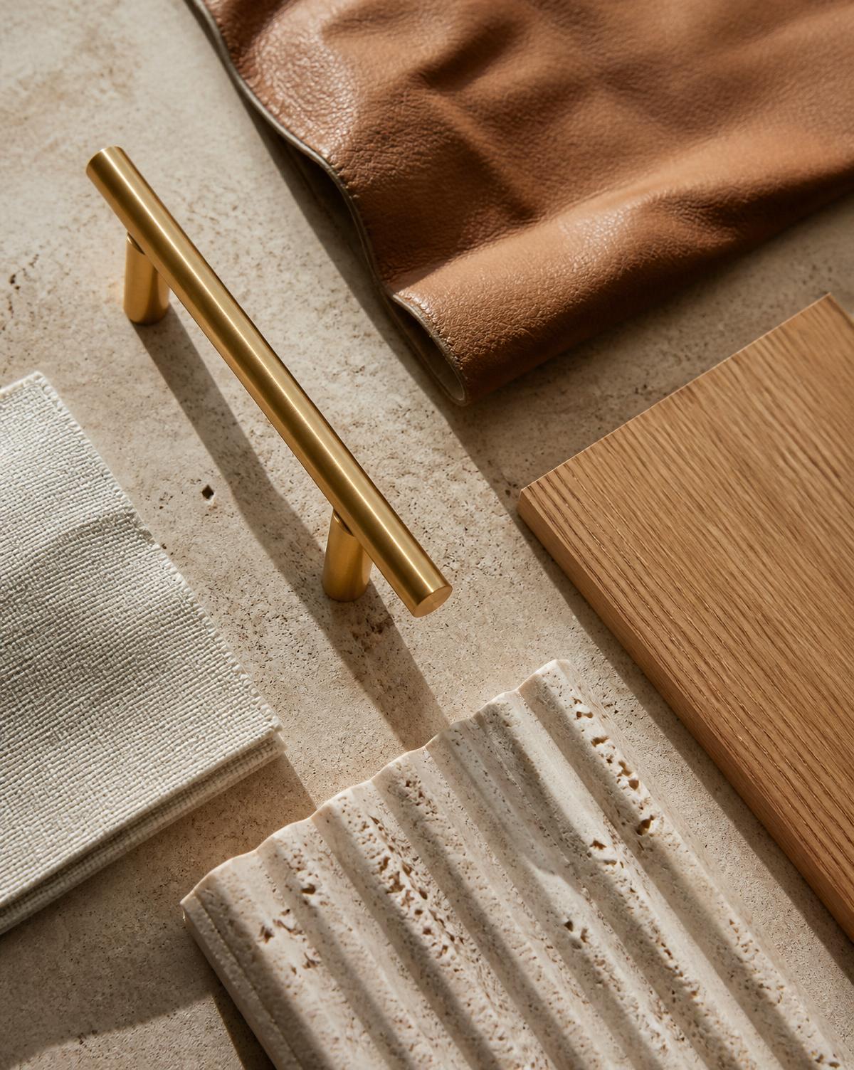 Material samples - leather, oak, travertine, brass