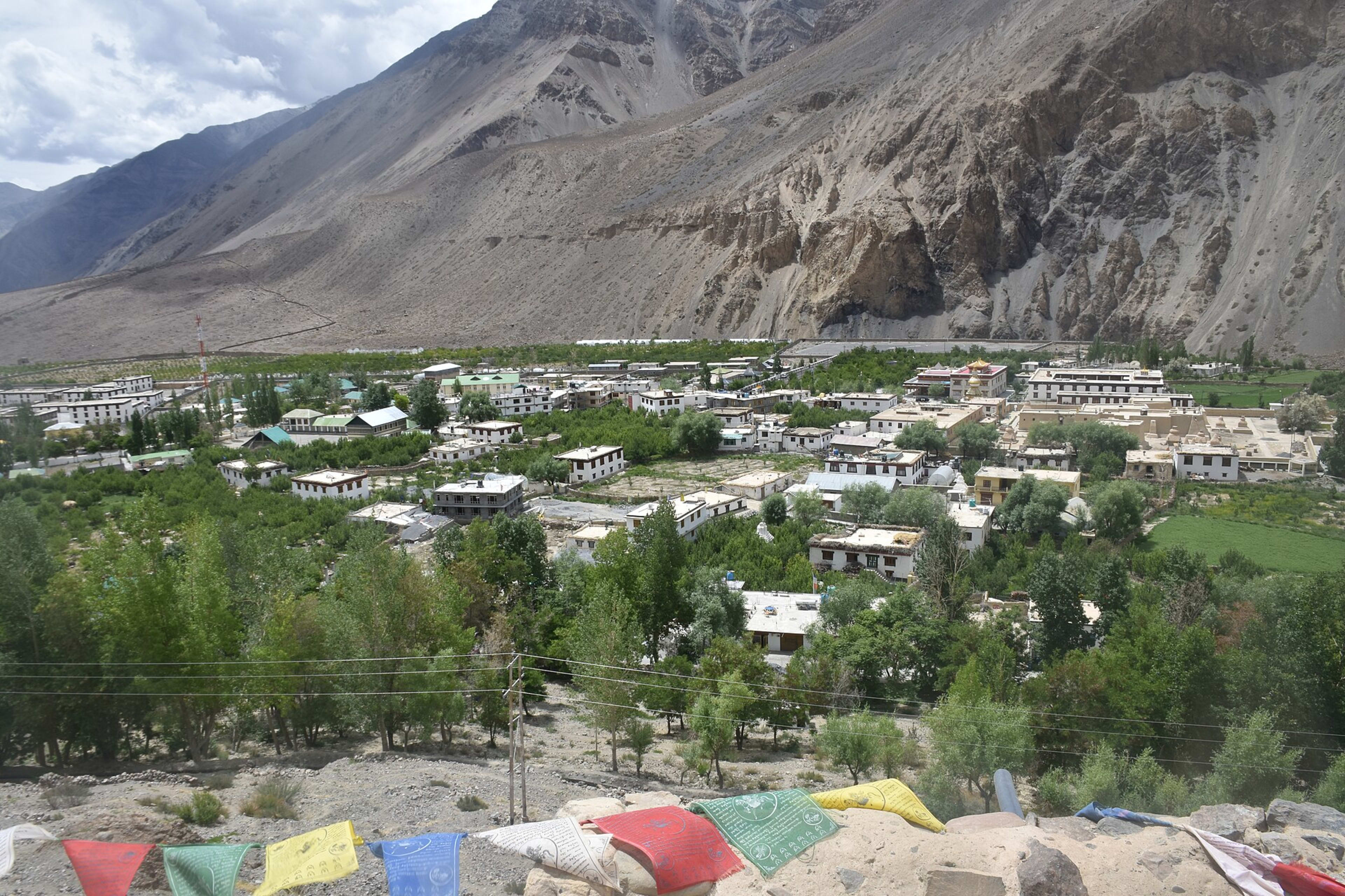 Tabo, Himachal Pradesh — Tabo from monks' cave to north of the town. Tabo Monastery, est. 996, is the light brown buildings t