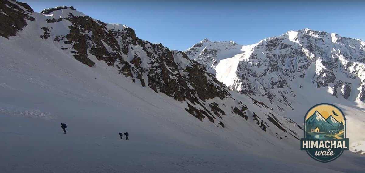 Snow wall at Buran Ghati pass with rappellers