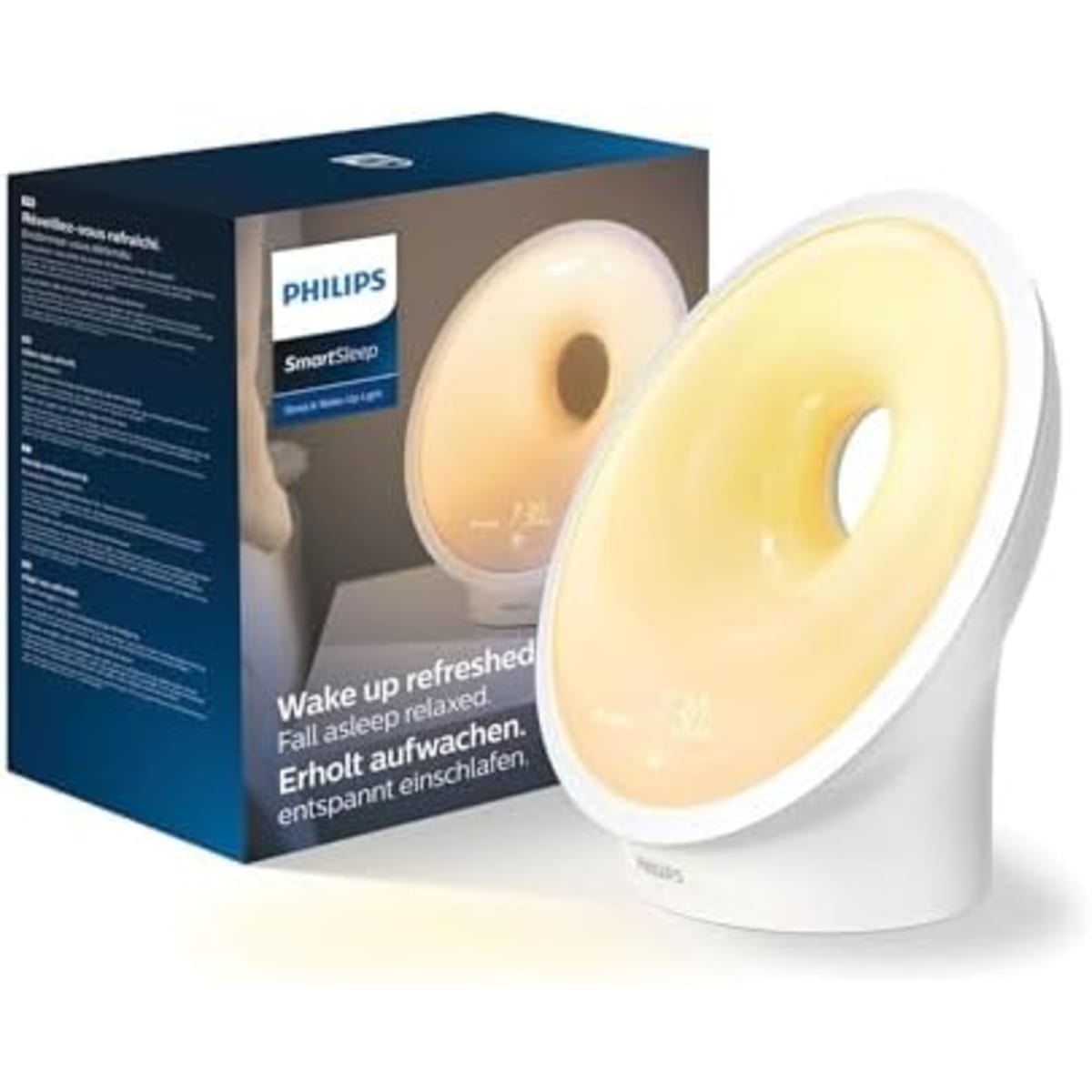 Philips HF3651/01 posé sur une table de chevet avec sa télécommande à côté