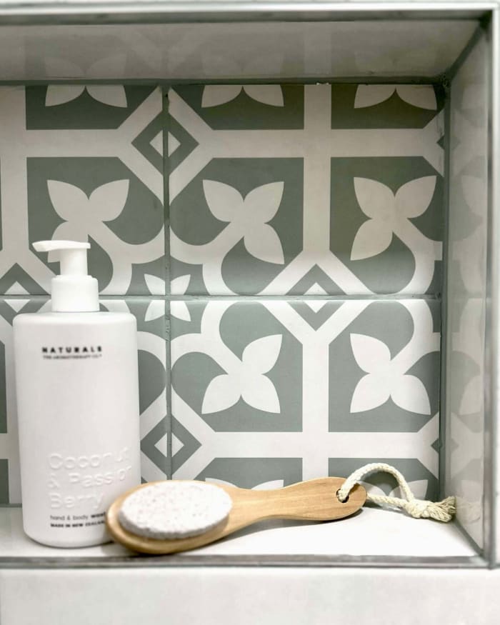 Preston Melbourne Bathroom renovation. green tile pattern in a shower shelf