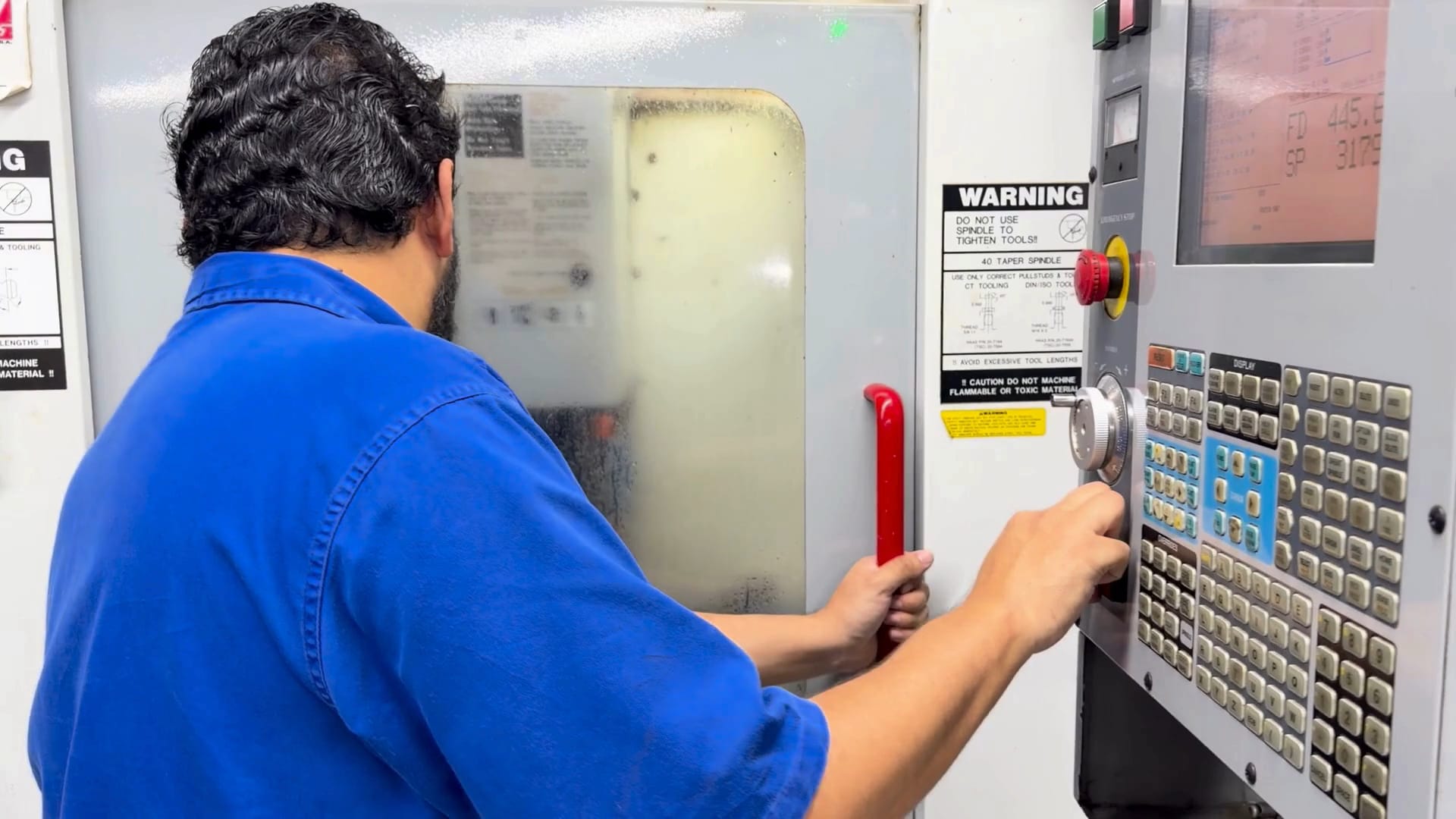 Skilled operator working with high-precision industrial machinery