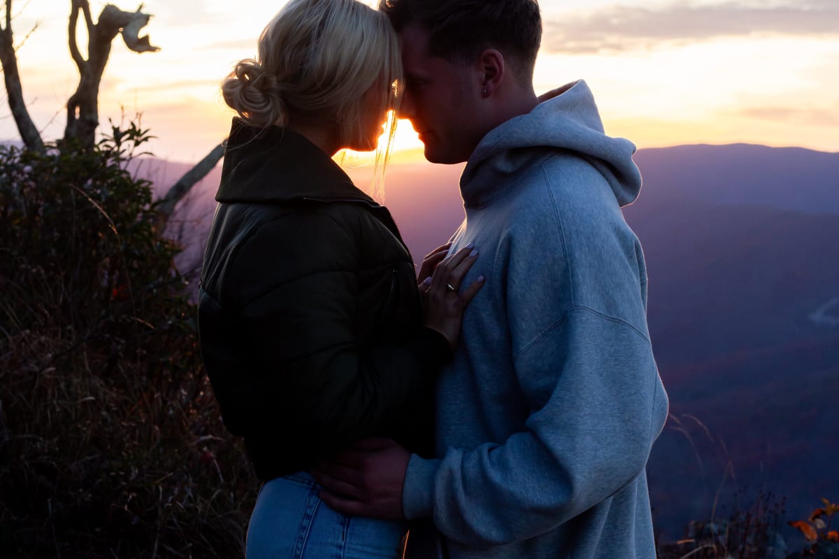 Romantic engagement session portraits at Raven's Roost Overlook on the Blue Ridge Parkway