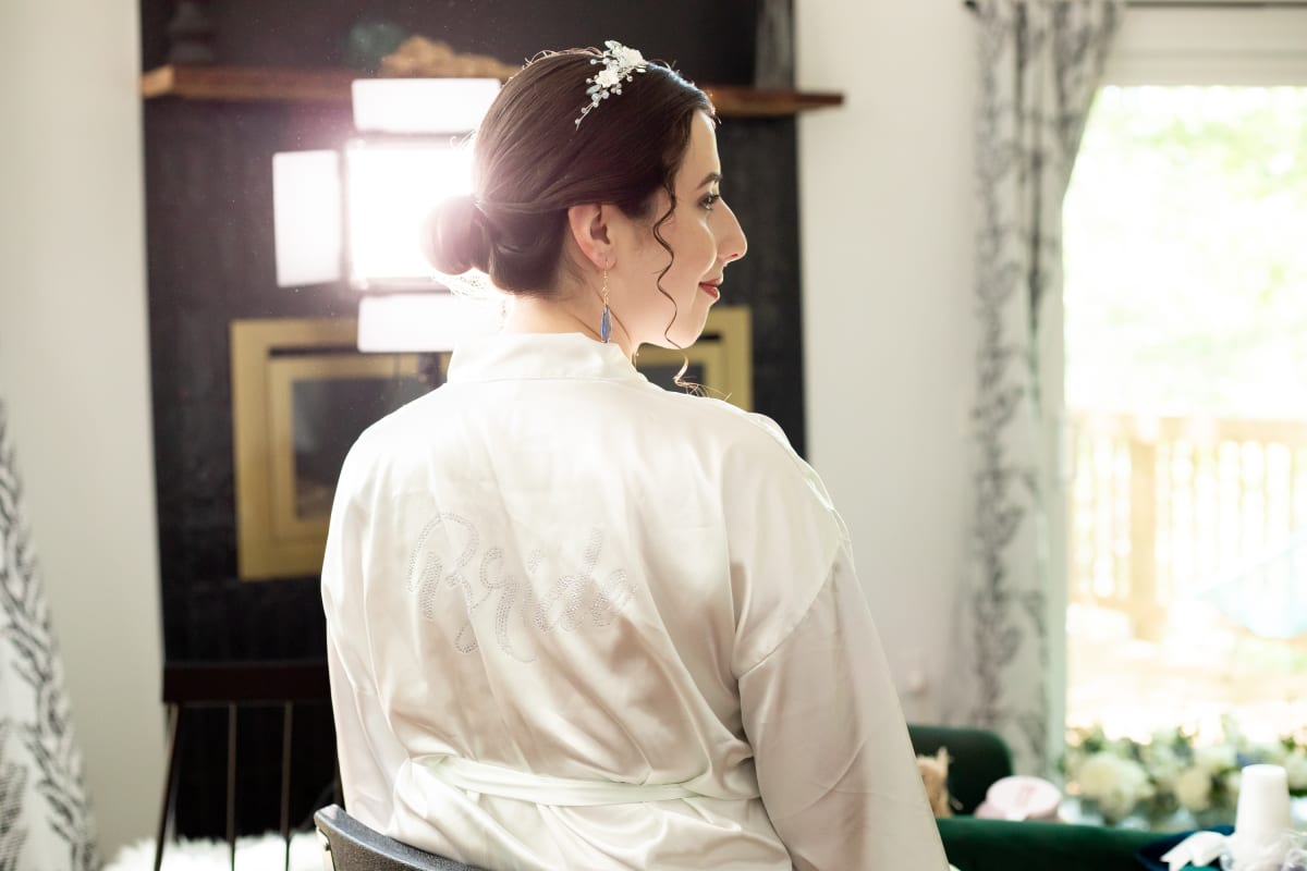 Bride getting ready for her Virginia microwedding at a Shenandoah cabin