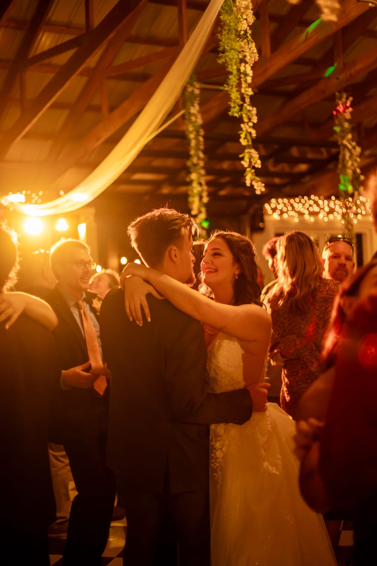 Warm dancefloor lighting during a Virginia microwedding reception