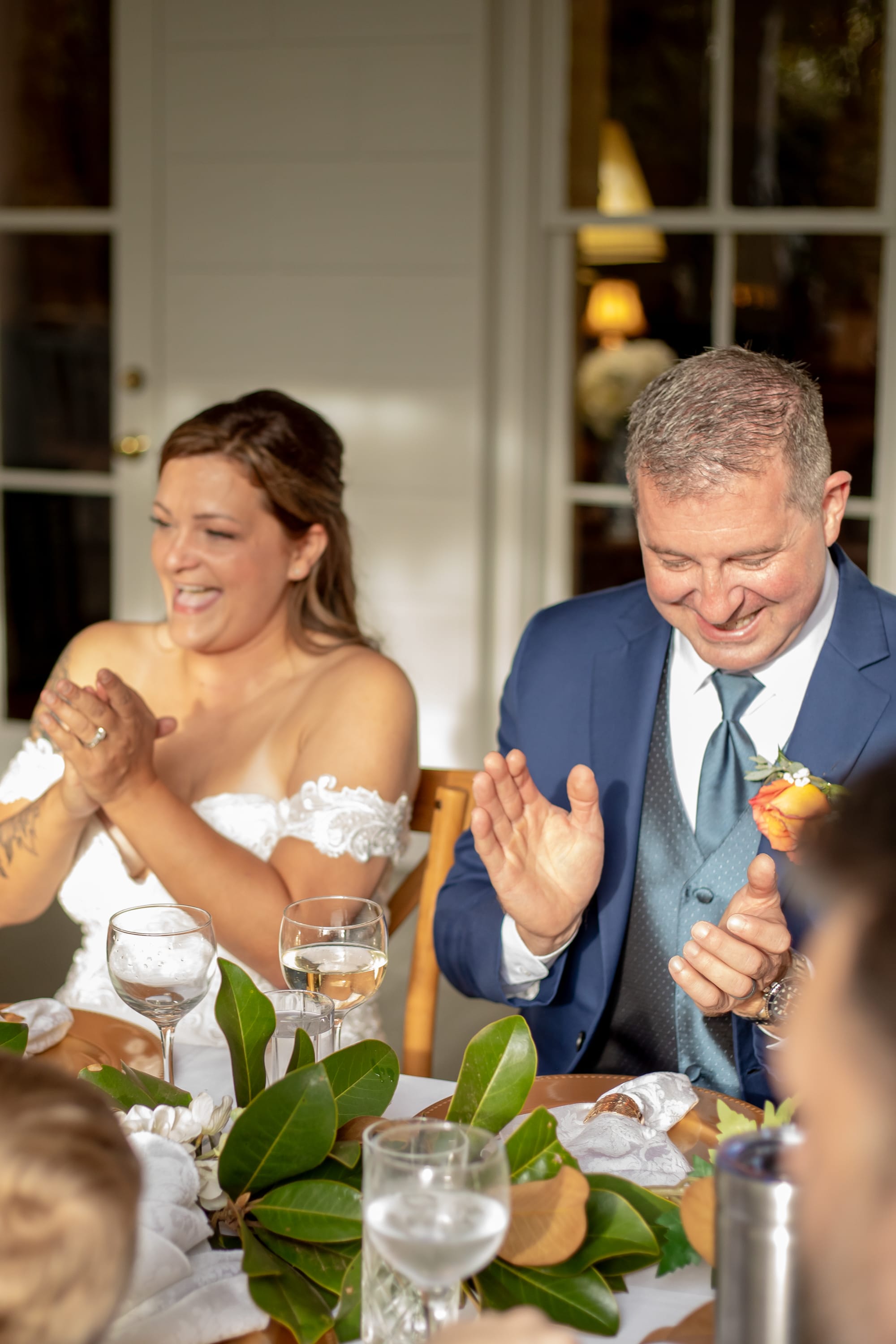 Couple enjoying laughs at their Fall microwedding in Virginia