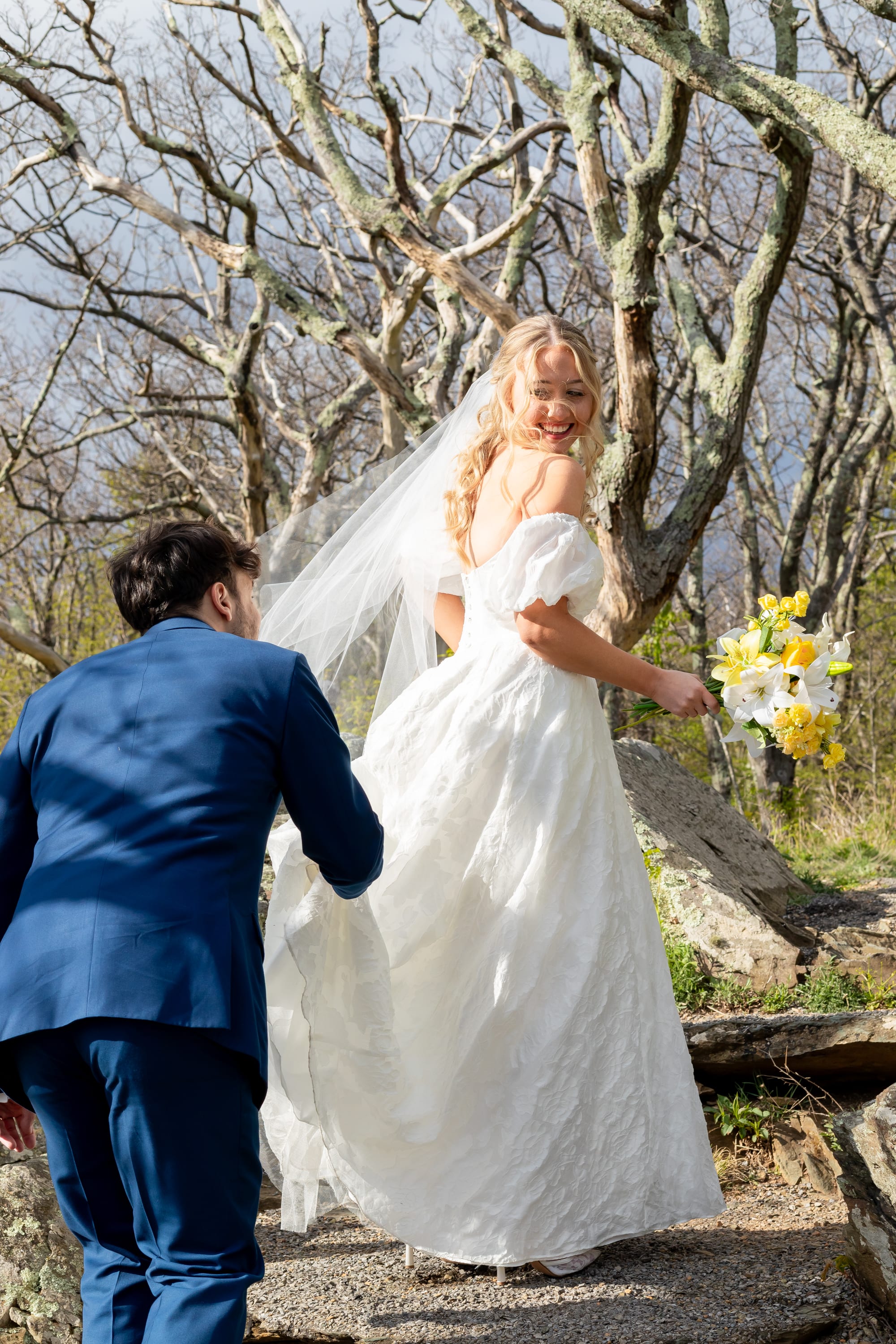couple hiking up a trail during their elopement in Shenandoah National Park