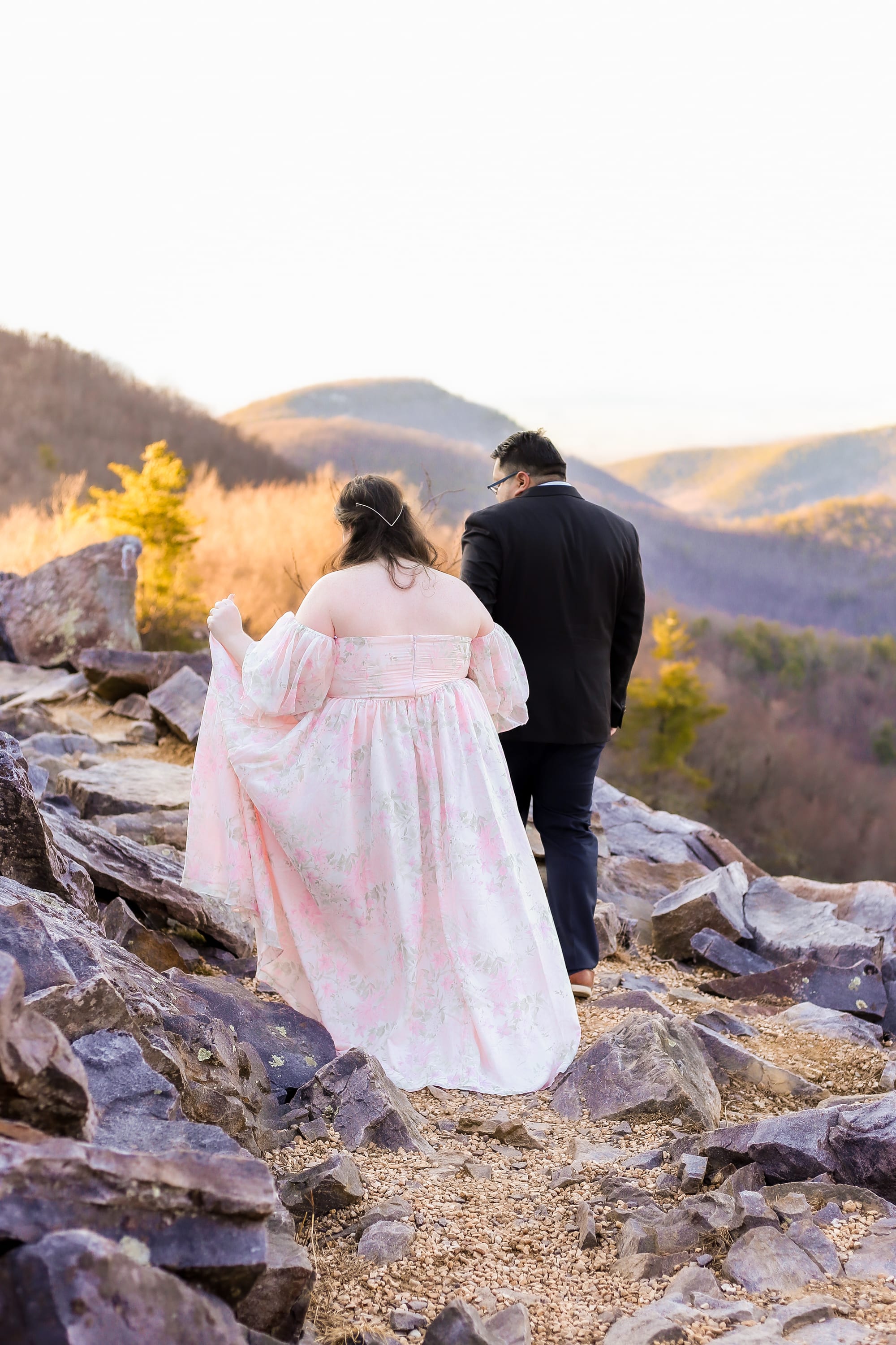 couple eloping at Blackrock Summit in Shenandoah National Park surrounded by fall foliage