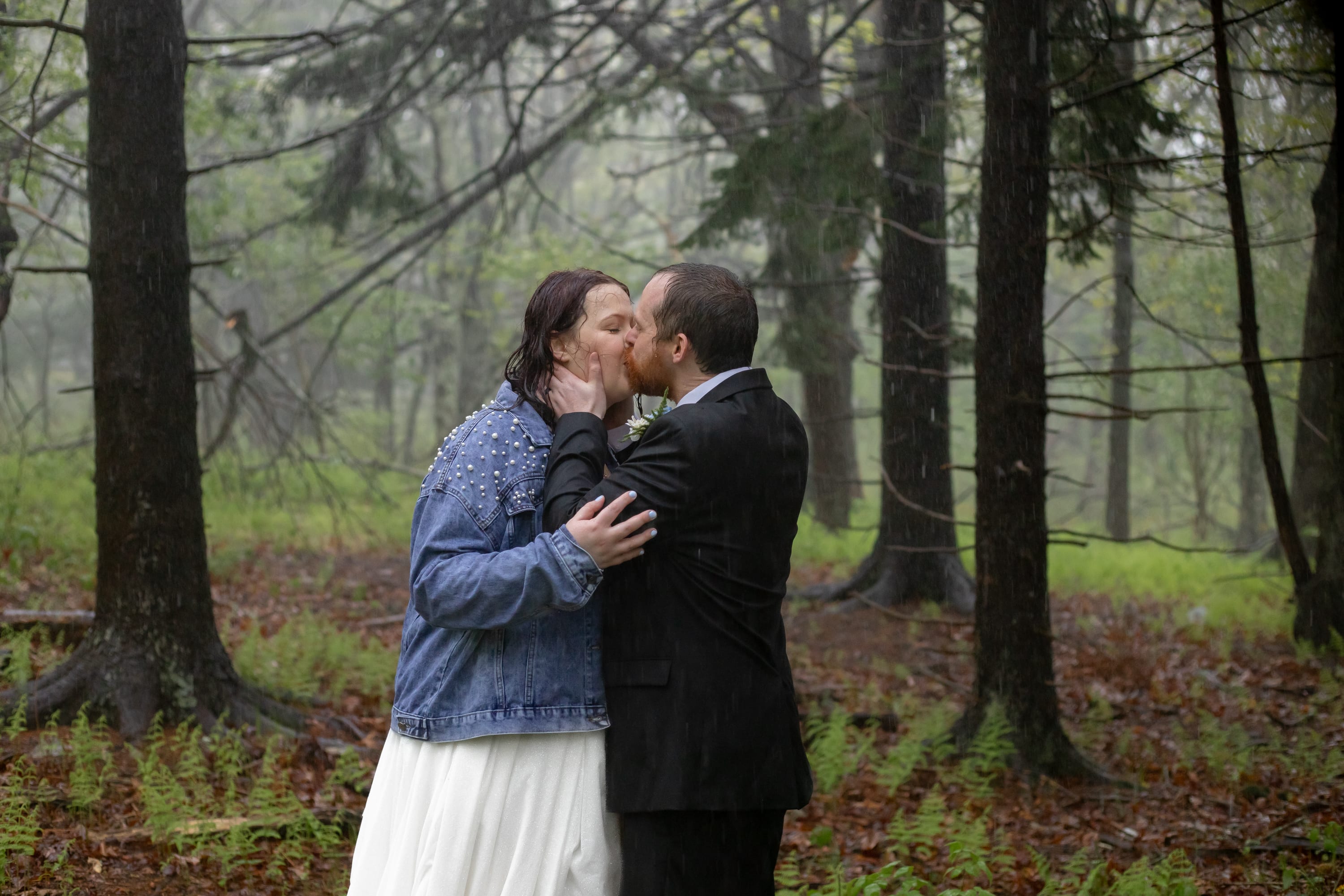 Couple kissing in a misty forest at Big Meadows in Shenandoah National Park, atmospheric and ethereal light
