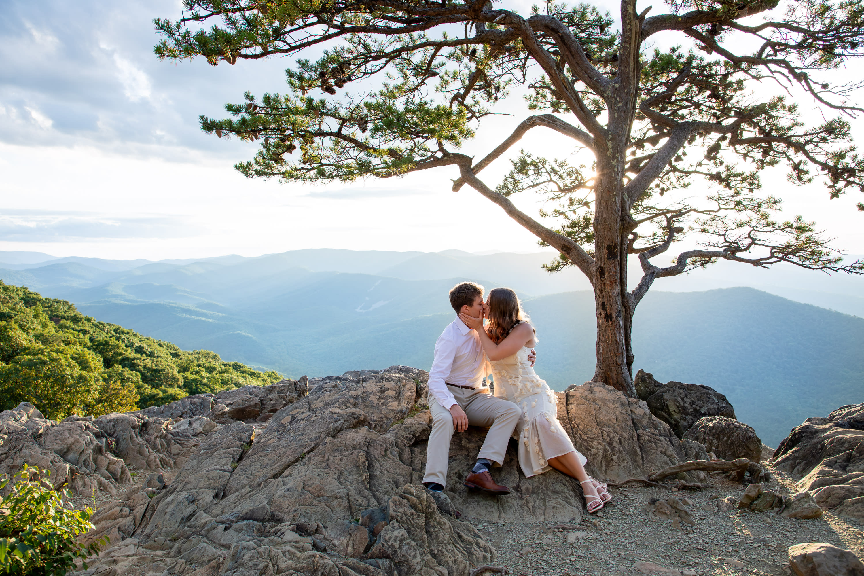 Sunlit couple at Raven's Roost Overlook on the Blue Ridge Parkway, Virginia