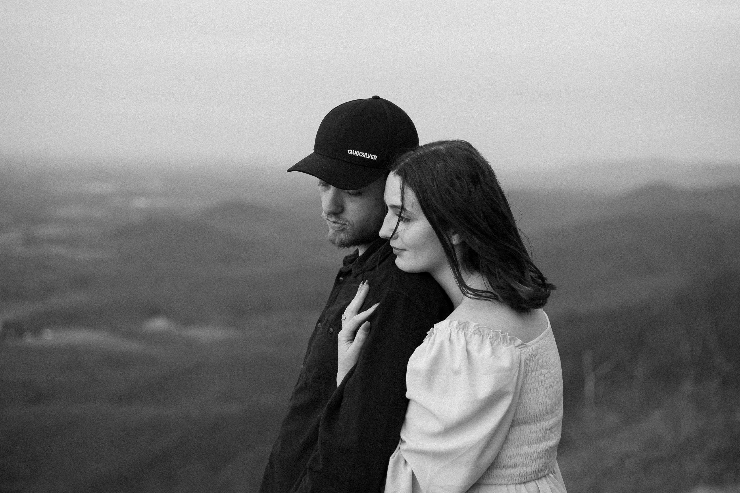 Couple sharing a quiet moment at Raven's Roost Overlook on the Blue Ridge Parkway, Virginia