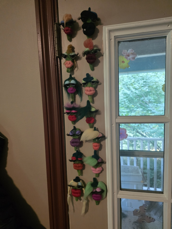 A collection of Hot Peppers displayed on a door