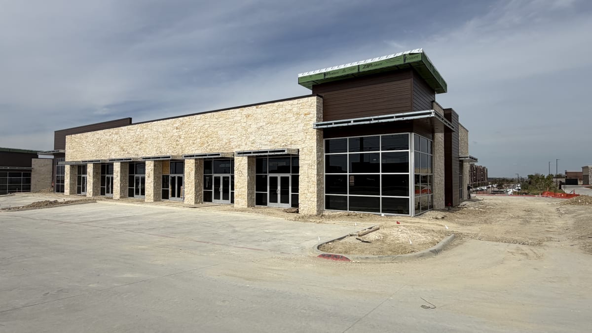 Central Plaza Shops A facade complete, storefronts going in, October 25, 2026