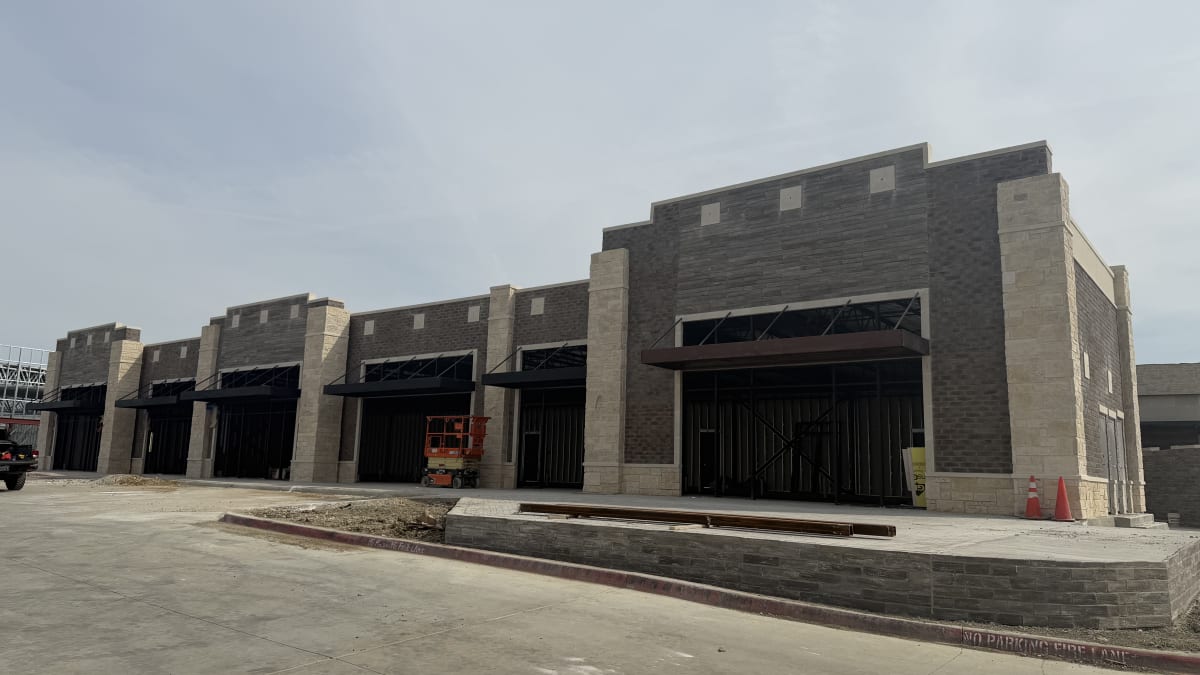 Celina Shops at Light Farms 3610 building masonry complete, storefronts going in, October 25, 2026