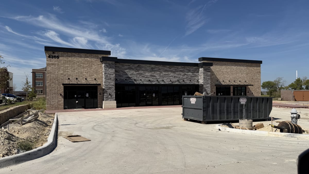 Ashton Gray building with site work wrapping up, October 11, 2026
