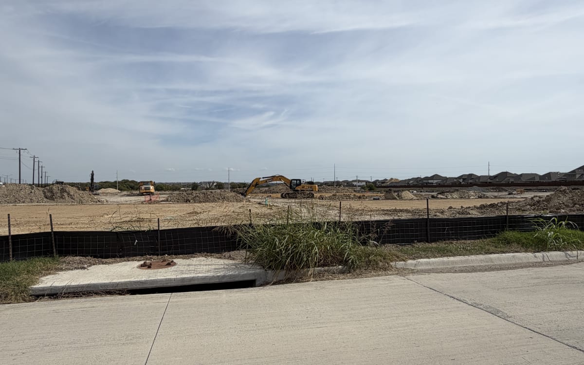 Celina Crossing site graded with silt fence along the frontage, October 25, 2026