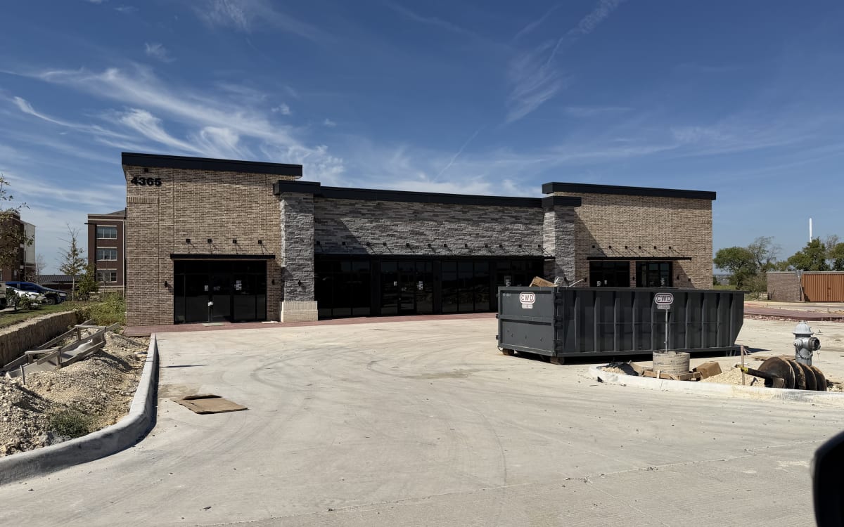 Ashton Gray building with site work wrapping up, October 11, 2026