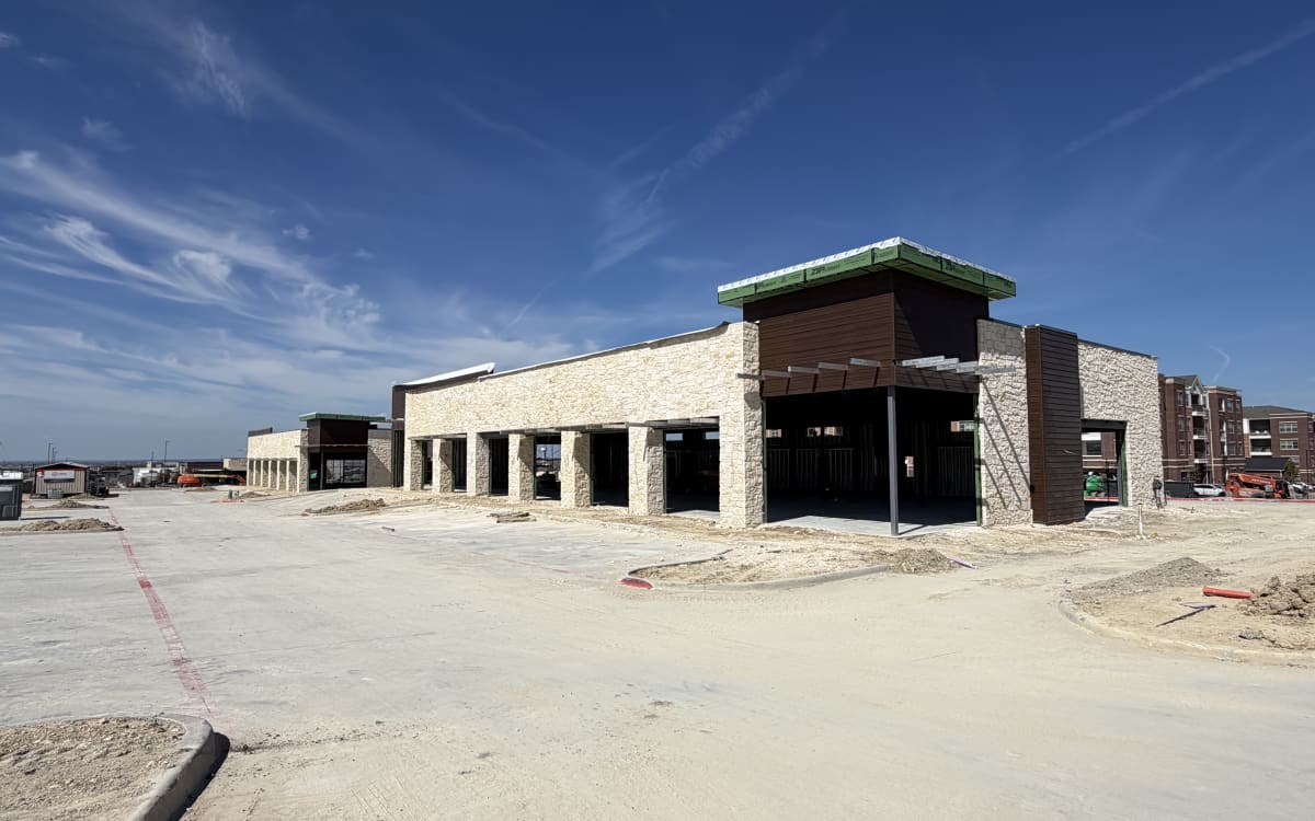 Central Plaza Shops A stone facade underway, October 11, 2026