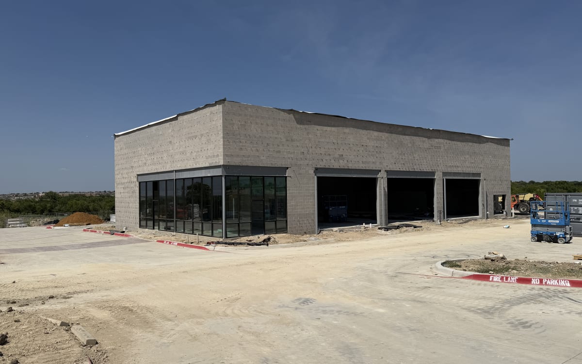 Discount Tire storefront glass installed, July 26, 2026