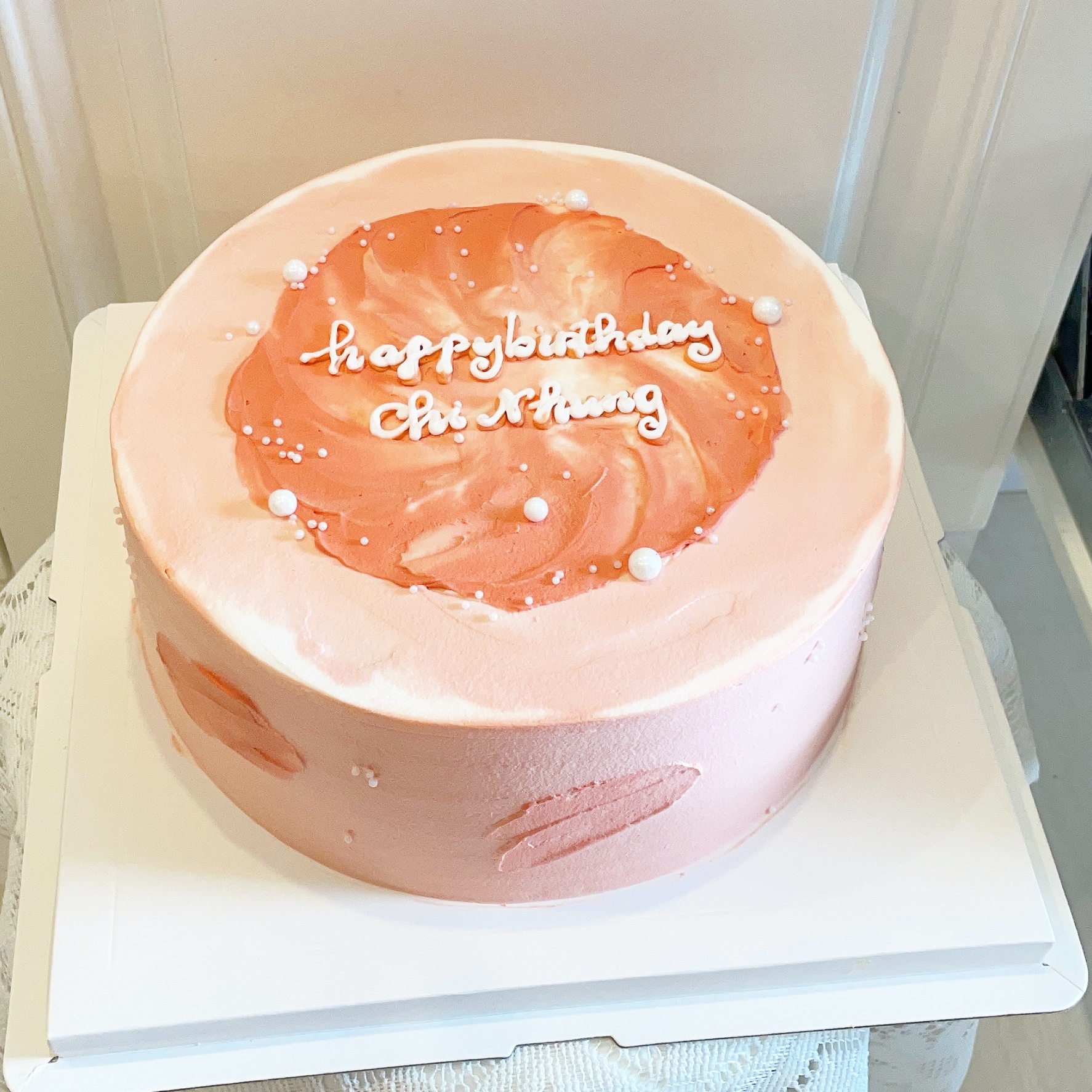 Bánh kem sinh nhật pastel cam hồng
