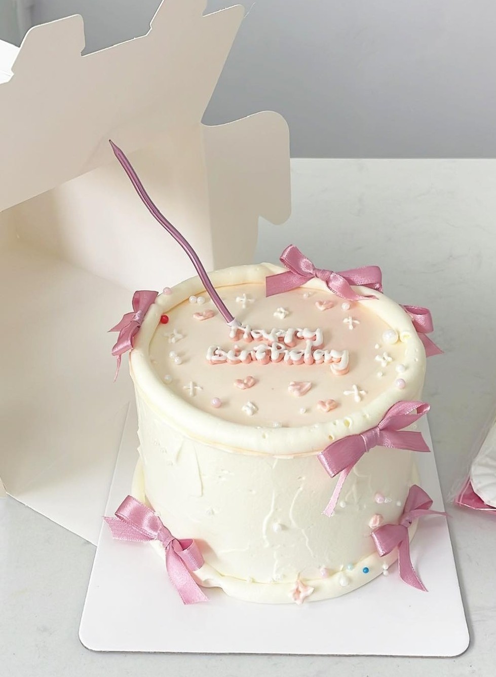 Bánh sinh nhật nơ hồng pastel