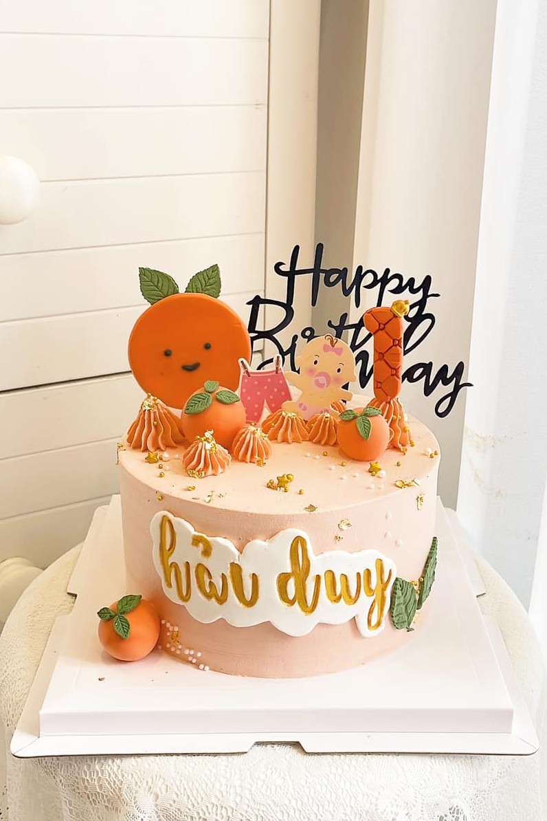 Bánh sinh nhật thôi nôi bé trai cam quýt